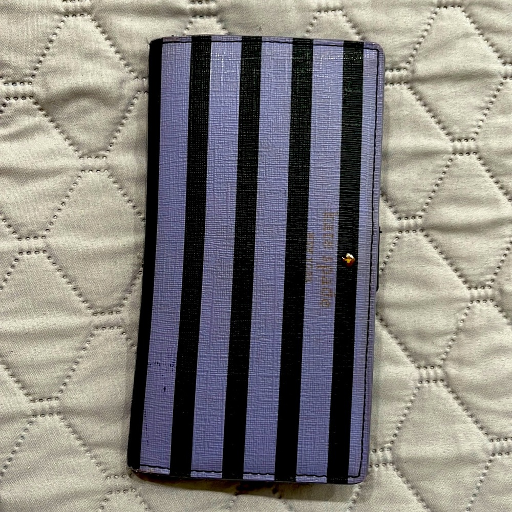 Super cute purple and black striped kate spade wallet!